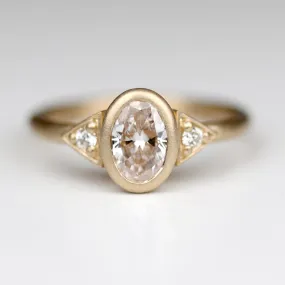 Custom Oval Deco Three-Stone Ring with a Diamond Foundry Diamond